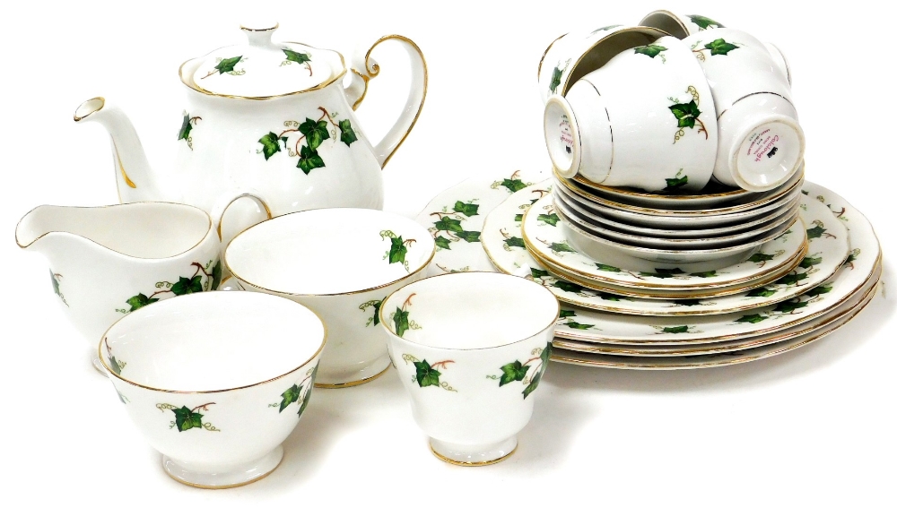 A Colclough china part tea service, comprising teapot, milk jug, two sugar bowls, five cups, six sau