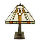 A modern Tiffany style table lamp, with square cream and orange shade, 47cm high.