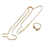 A 9ct gold heart shaped pendant and chain, the 9ct gold heart shaped pendent makers stamped TJ, on a