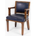 An oak captain's type chair, with a blue faux leather inset top, with button back, 88cm high, 47cm w