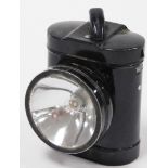 A metal GPO bicycle lamp, with lift up lid and back clip, 11cm high.