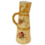 A Royal Worcester blush ivory jug, decorated with sprays of flowers, and a gilt handle, with purple