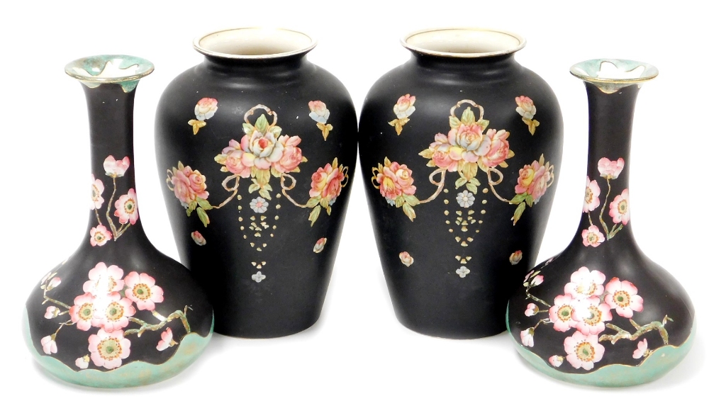 A group of Crown Devon wares, to include a pair of Crown Devon vases with rose decoration, and two a