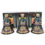 Three Bells Scotch Whisky decanters, comprising Christmas decanter 1994, Christmas decanter 1995 and