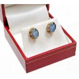 A pair of 9ct gold and opal stud earrings, in basket setting, with butterfly backs, 2g all in,