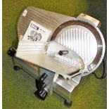 A Buffalo meat slicer, with instruction manual.