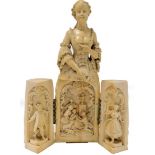 A 19thC French Dieppe carved ivory figure of Lady Pompadour, in 18thC costume with flowing dress, op