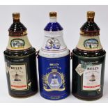 Three Bells Scotch Whisky decanters, comprising of Arthur Bell & Sons Christmas 1989 decanter, Arthu