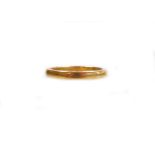 A 22ct gold wedding band, of plain design, makers stamp T.R.W and S, Birmingham 1986, ring size J½,