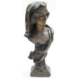 An Art Nouveau plaster bust of female by Van Hesselt & Co, with flowing hair and arabesque headband,