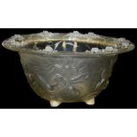 A large art glass bowl, in the Lalique style, depicting mermaids and water lilies, on a four foot st
