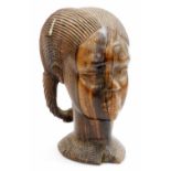 A heavily carved tiger wood style African tribal head, formed as a girl with elaborate hair and neck