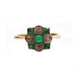 An Art Deco dress ring, of rectangular design, set with five emeralds and four tiny diamonds, in a r