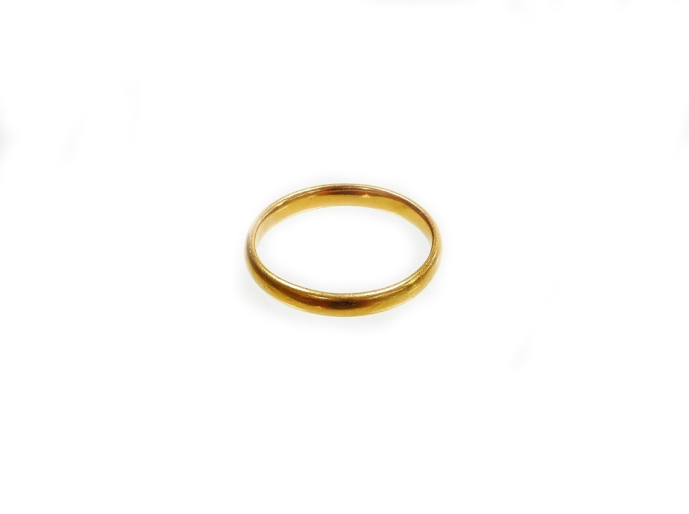 A 22ct gold wedding band, of plain design, makers stamp HA, London, undated, ring size S½, 4g.