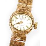 A Rotary 9ct gold ladies wristwatch, with small oval gold coloured dial, with a 21 jewel movement, o