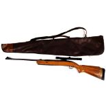 A BSA air rifle, on a turned wooden body, with BSA 4X20 scoop, in a leather slip case (AF), 112cm lo