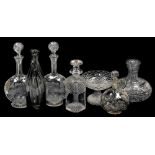 A quantity of glass decanters and vases, to include a pair of cut glass decanters, with etched fern