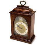 An Olivant and Botsford of Manchester Elliott mantel clock, the brass dial with Roman numerals and F