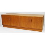 A G Plan teak low sideboard, with two cupboards each with two cupboard doors, with G Plan stamped to