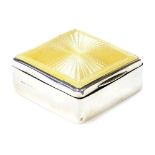 A George V silver and enamel cigarette box, the rectangular top with yellow enamelled decoration, li