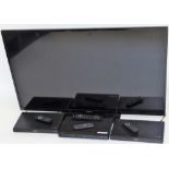A Panasonic 49" flat screen television, with various accessories, the television with power lead, re