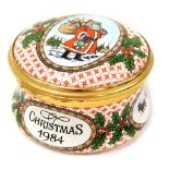 A Halcyon Days enamel Christmas trinket box, entitled Christmas 1984 depicting Santa Claus and holly