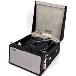 A Hacker record player, in carry case type design, 26cm high, 45cm deep, 40cm wide. Buyer note: This