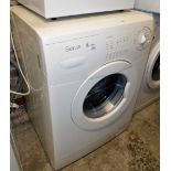 A Servis 8kg washing machine.