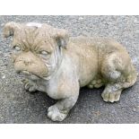 A reconstituted stone garden ornament of a pug.