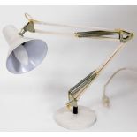 An anglepoise desk lamp, in white coloured metal, on circular foot, 80cm high overall.