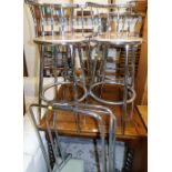 A set of four chrome finish kitchen chairs, and a metal three stand rack.