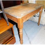 A pine kitchen table, on rectangular top with shaped ends on turned supports, 78cm high, 108cm,