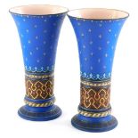 A pair of Mettlach vases, each with incised decoration in ecclesiastical Gothic style, in blue,