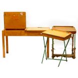 A Tri-ang child's vintage desk, with hinged top and metal legs, another similar desk and a double