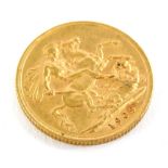 An Edward VII full gold sovereign, dated 1909.