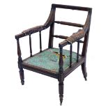 An early 19thC mahogany open armchair, the moulded frame with a double rope twist back, a padded