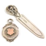 Two items of small silver, to include an Edwardian thistle and horse shoe bookmark, Birmingham 1909,