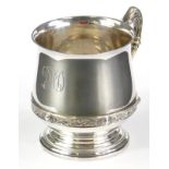 A George V silver cup, by Adie Brothers, of compressed bell shaped form, angular handle, inverted