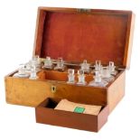 A 19thC mahogany medicine box, the rectangular hinged lid enclosing a series of bottles and