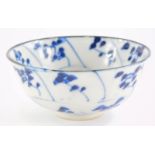 An oriental porcelain tea bowl, decorated with leaves, etc., in blue, possibly Japanese, 8cm