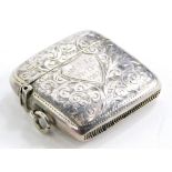 A silver Vesta case, with floral engraved decoration and shield front, with initials W K December