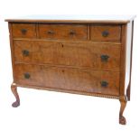 A continental walnut commode, the top with a moulded edge above three frieze drawers and two further