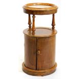 A Victorian mahogany cylindrical pot cupboard, the top with a moulded gallery above a white marble