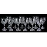 A set of Baccarat cut glass wine glasses, each with a waisted stem. (12)