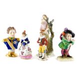 A collection of five continental porcelain items, to include a German Mansion House dwarf type