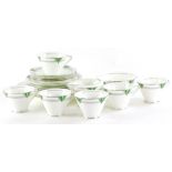 A Coalport porcelain Art Deco part tea service, each piece decorated in green and silver with