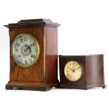 Two mantel clocks, one in an oak case, the dial stamped Fattorini and Sons Limited Bradford, the