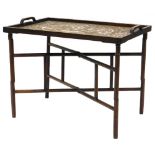 An oriental hardwood tray top table, with a raised gallery, inlaid with mother of pearl with