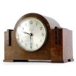 An Art Deco mantel clock, the silvered dial stamped Walker and Hall, 30cm wide.