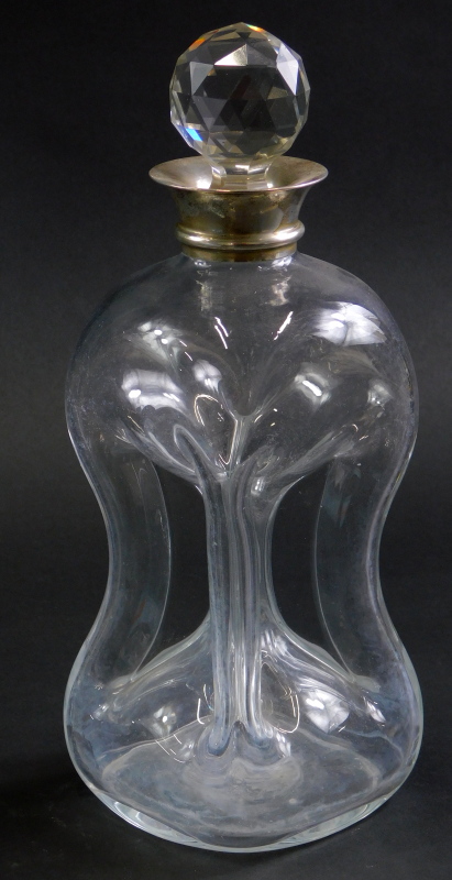 A George V Elkington and Co. cut glass decanter with silver collar, of waisted form, associated